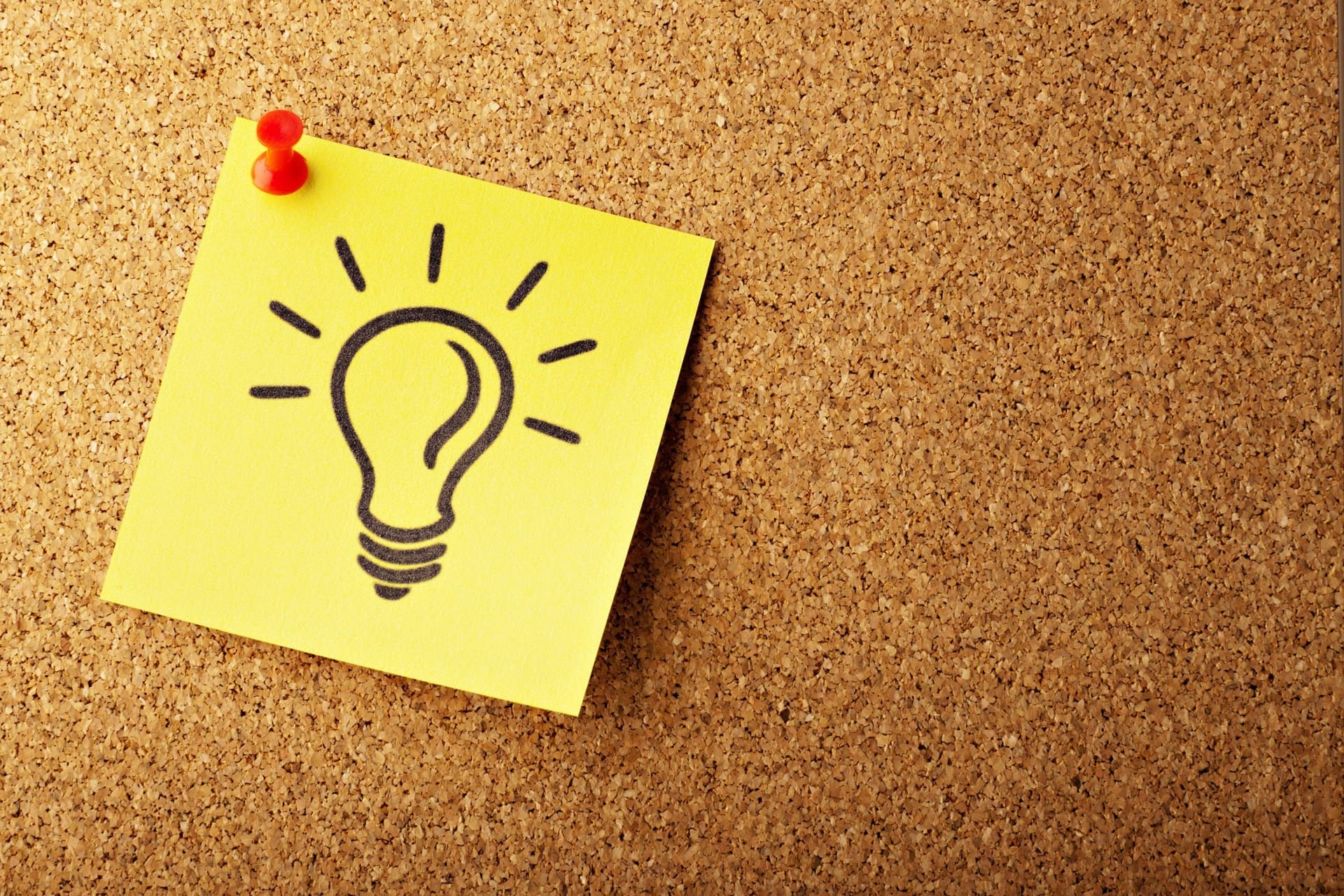 Lightbulb sticky note representing an idea captured by a visual scribe